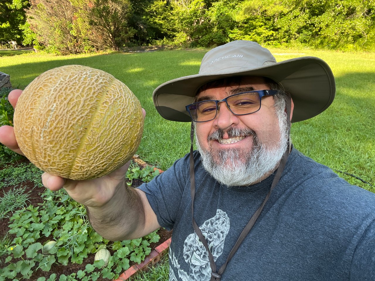 First Cantaloupe, Monster Zucchini, and Finally Seeing a Watermelon